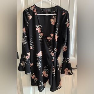 Polly & Esther Floral wrap around dress with bell sleeves.